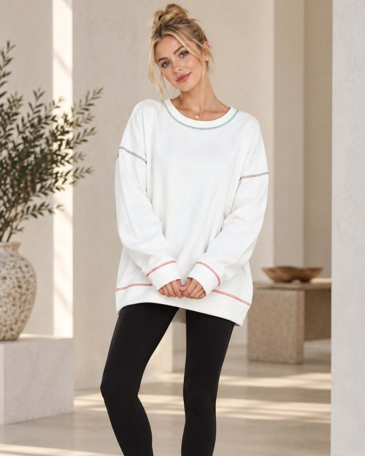 Made in USA white oversized crewneck sweatshirt with colorful contrast stitching and long sleeves