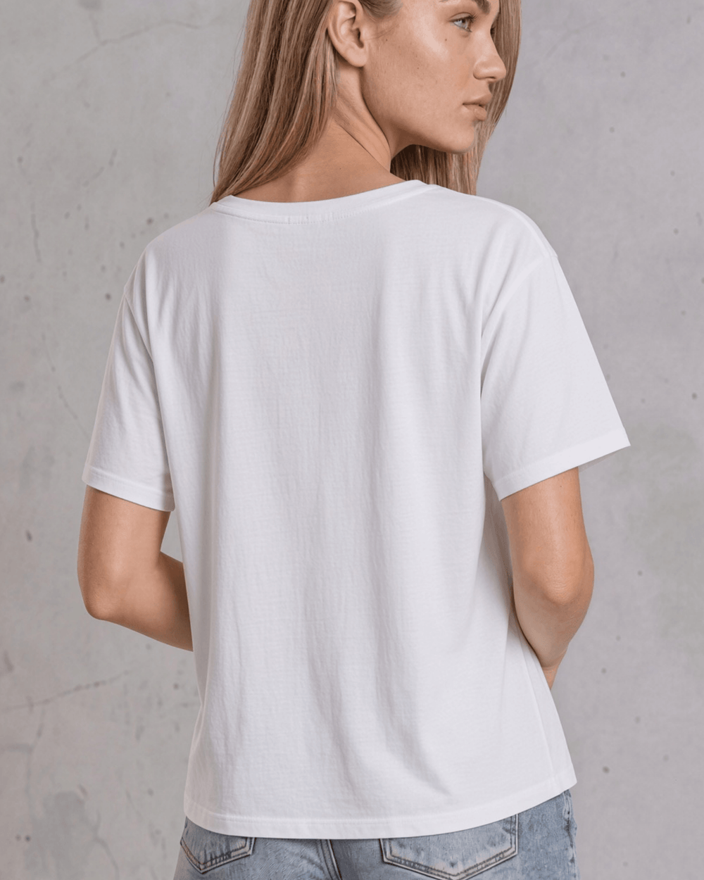 Made in USA, women's weekend boxy tee has a loose, flowy fit and wide neckline. Shop Black or White in sizes XS–2XL; 50% Lenzing Modal, 50% Polyester.