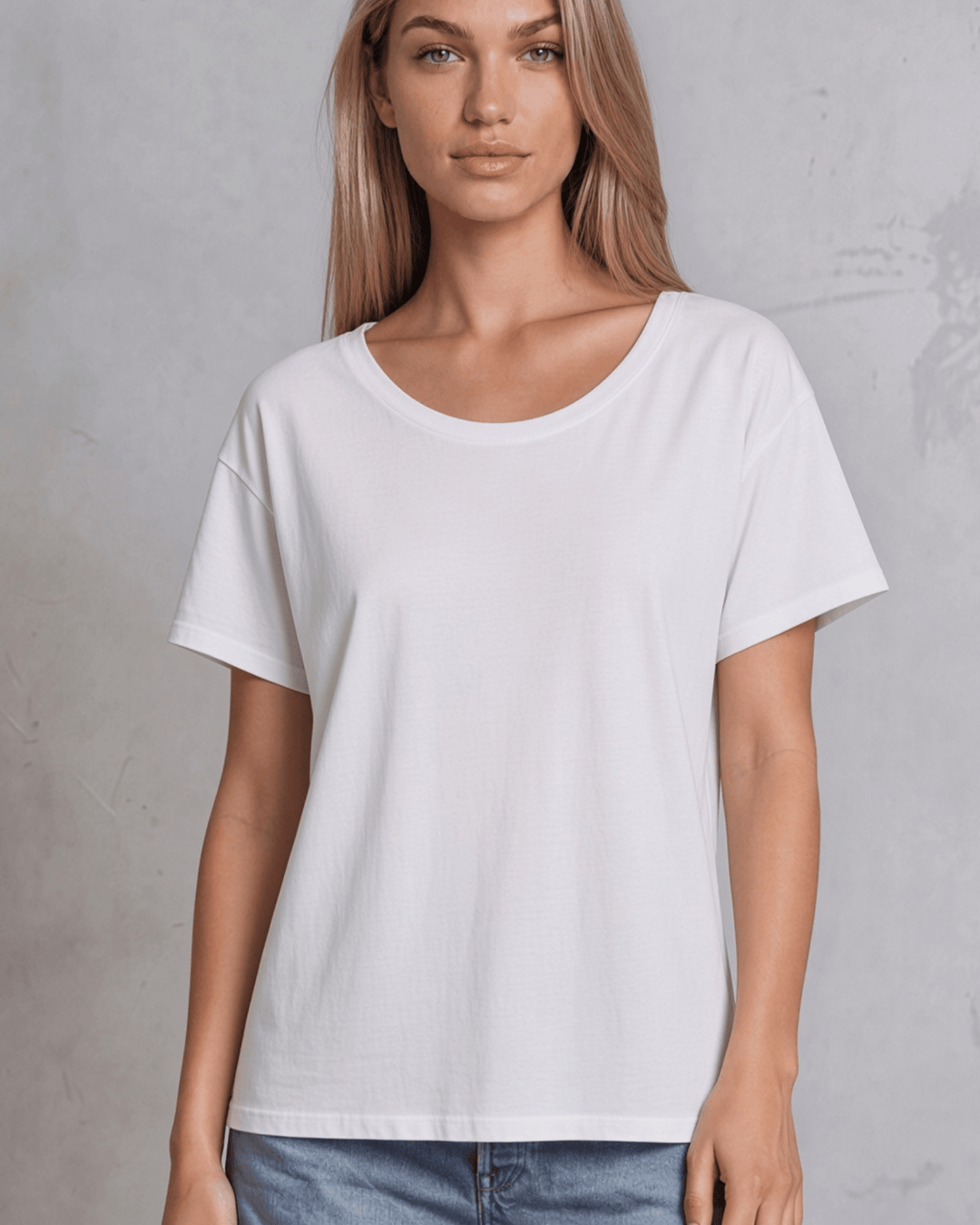 Made in USA, women's weekend boxy tee has a loose, flowy fit and wide neckline. Shop Black or White in sizes XS–2XL; 50% Lenzing Modal, 50% Polyester.