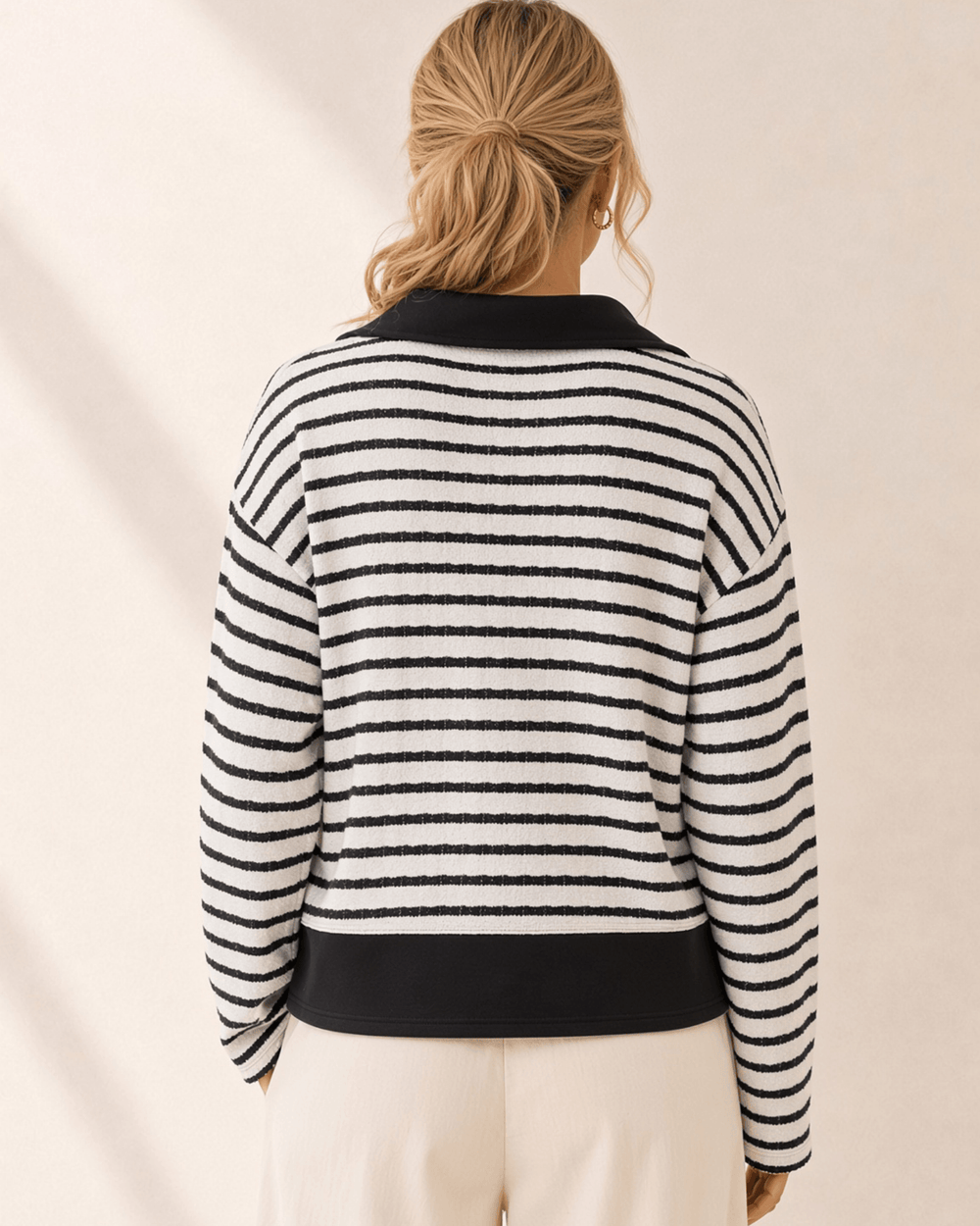 Made in USA. Women's black & white striped polo pullover sweater with contrast collar, open V-neck & solid hem band. Relaxed fit. Sizes S-L.