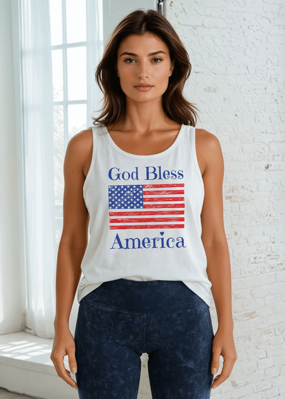 God Bless America Flag Graphic Tank Top | Made in USA Cotton, Say it in something made here! USA-made God Bless America flag graphic tank in white garment wash. Soft 95% cotton, relaxed fit, grown & sewn in America.