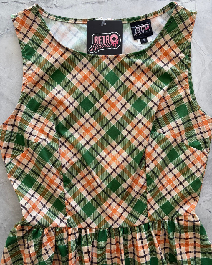 Made in USA. Shop the Rust &amp; Green Plaid cotton midi dress by Retrolicious, with a high neckline, full swing skirt and hidden pockets. Sizes XS–4X.