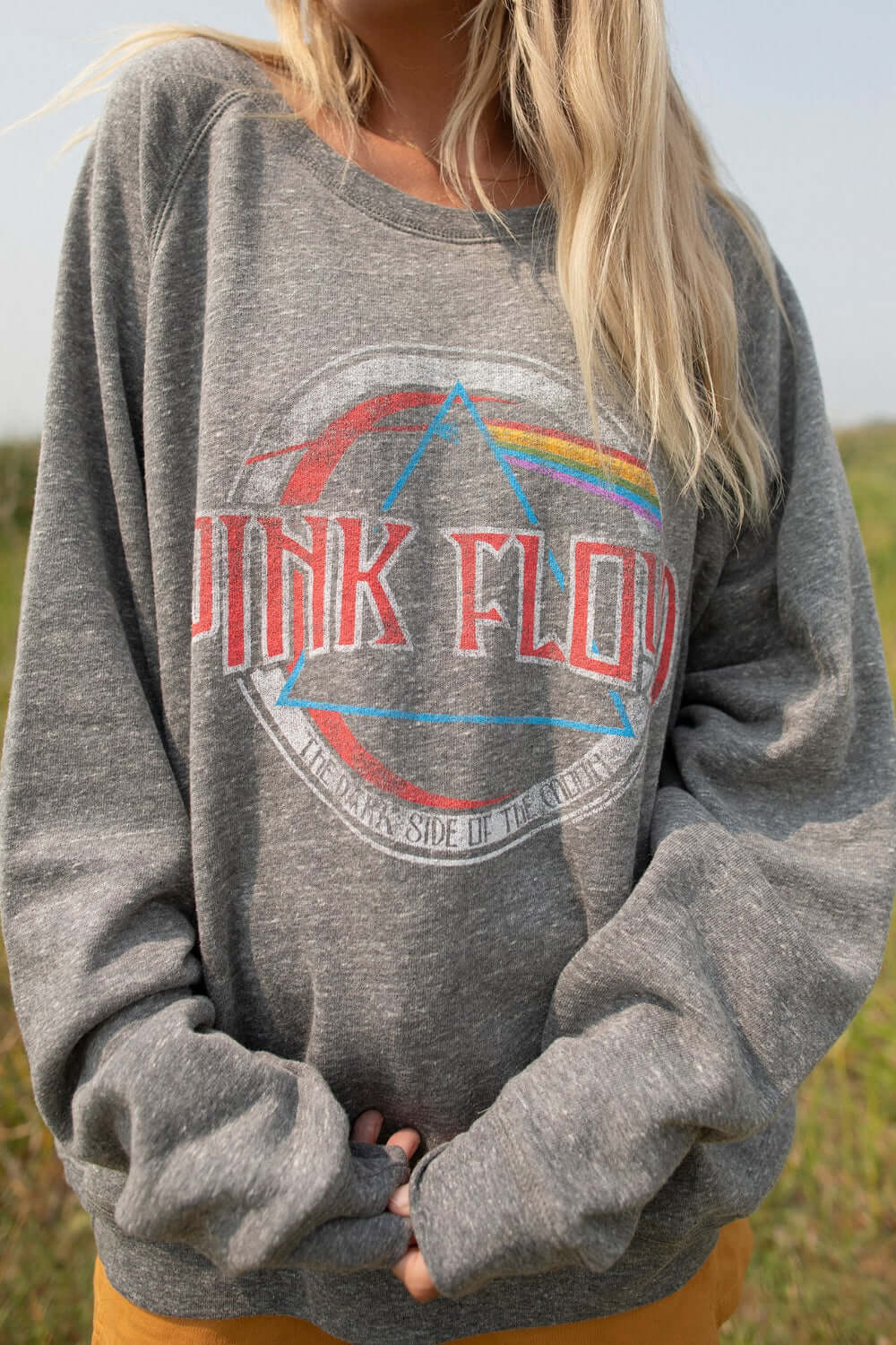 Loving our new organically made Pink Floyd sweatshirt!+ Heather Gray Colored Sweatshirt+ Crew neck+ Heathered gray colored fleece+ Raglan, Cuffed sleeves+ Featuring a Pink Floyd logo, Made in USA
