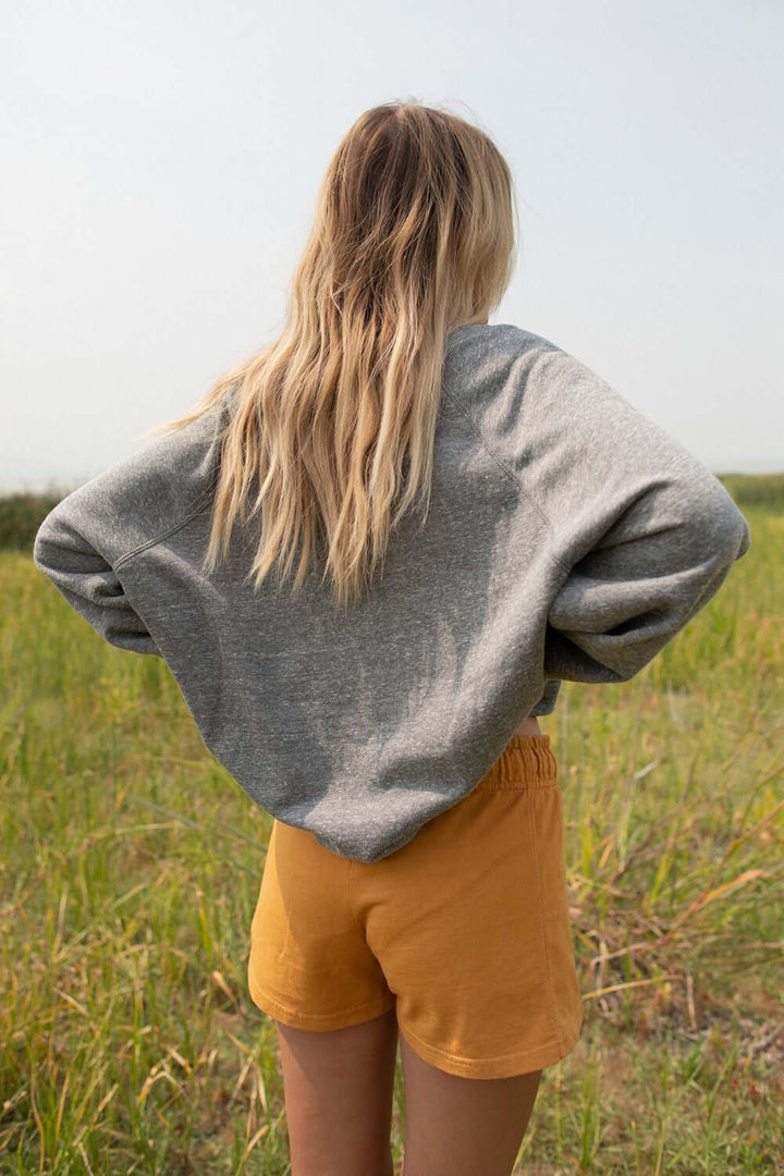 Loving our new organically made Pink Floyd sweatshirt!+ Heather Gray Colored Sweatshirt+ Crew neck+ Heathered gray colored fleece+ Raglan, Cuffed sleeves+ Featuring a Pink Floyd logo