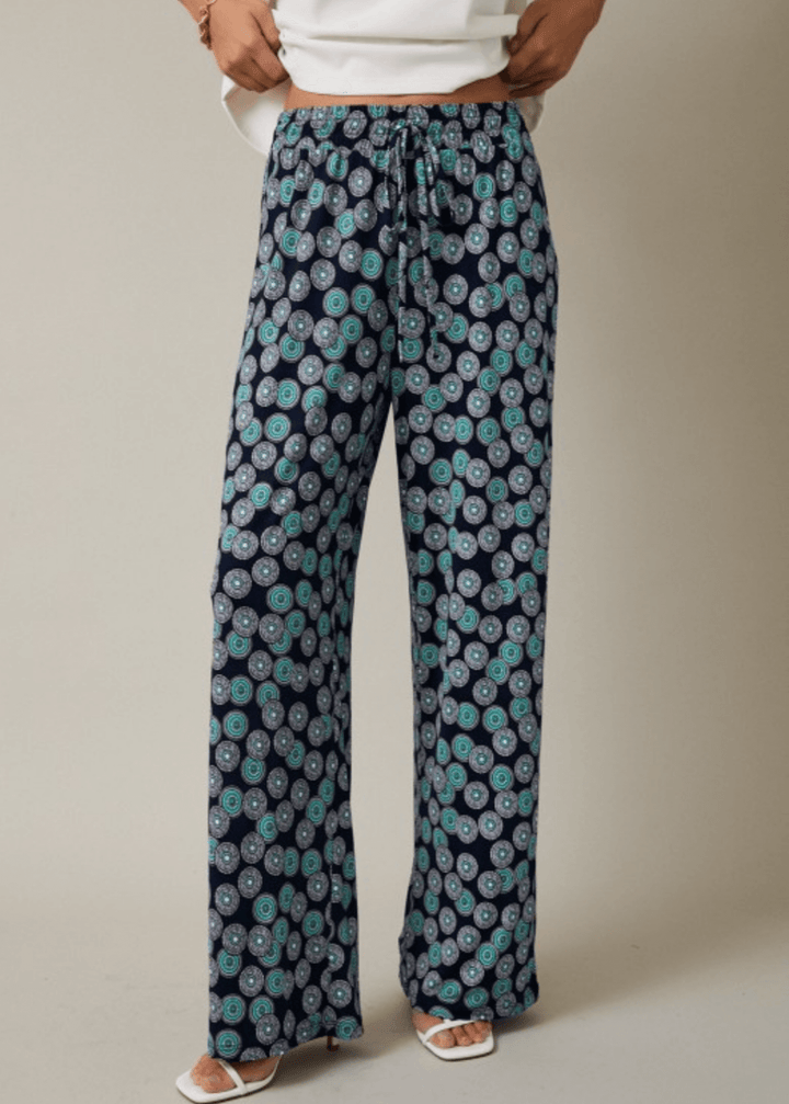 Shop the Sand Dollar Seas Drawstring Pants — lightweight jersey stretch, relaxed fit, side pockets &amp; drawstring waist. Casual comfort, Made in USA.