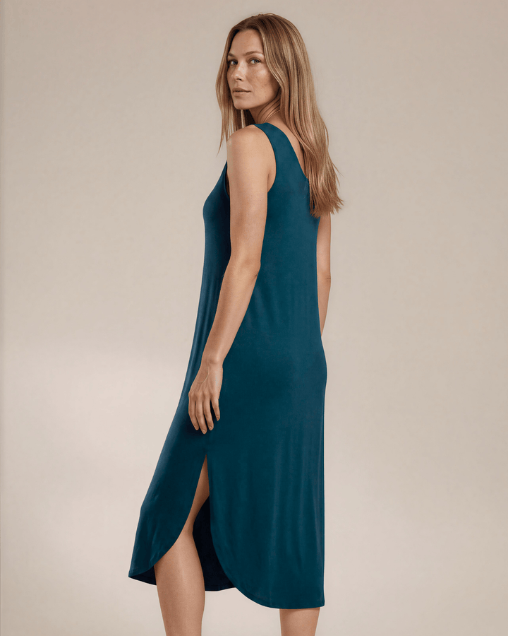 Shop the Sammie Sleeveless Maxi Dress in teal. Relaxed fit, scoop neck, side pockets &amp; slits. 95% Rayon, 5% Spandex. Made in USA. Free shipping may apply.