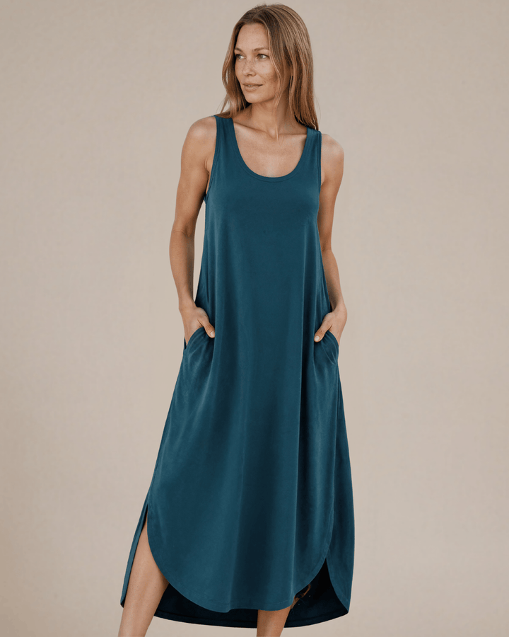 Shop the Sammie Sleeveless Maxi Dress in teal. Relaxed fit, scoop neck, side pockets &amp; slits. 95% Rayon, 5% Spandex. Made in USA. Free shipping may apply.