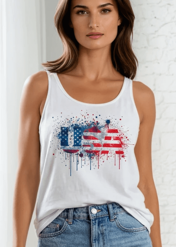 Celebrate your patriotic spirit in this eye-catching Paint Splatter USA American Flag Tank. Crafted from soft, breathable 95% cotton and 5% spandex blend.  Made right here in the USA with American cotton, this versatile tank delivers comfort and style with every wear