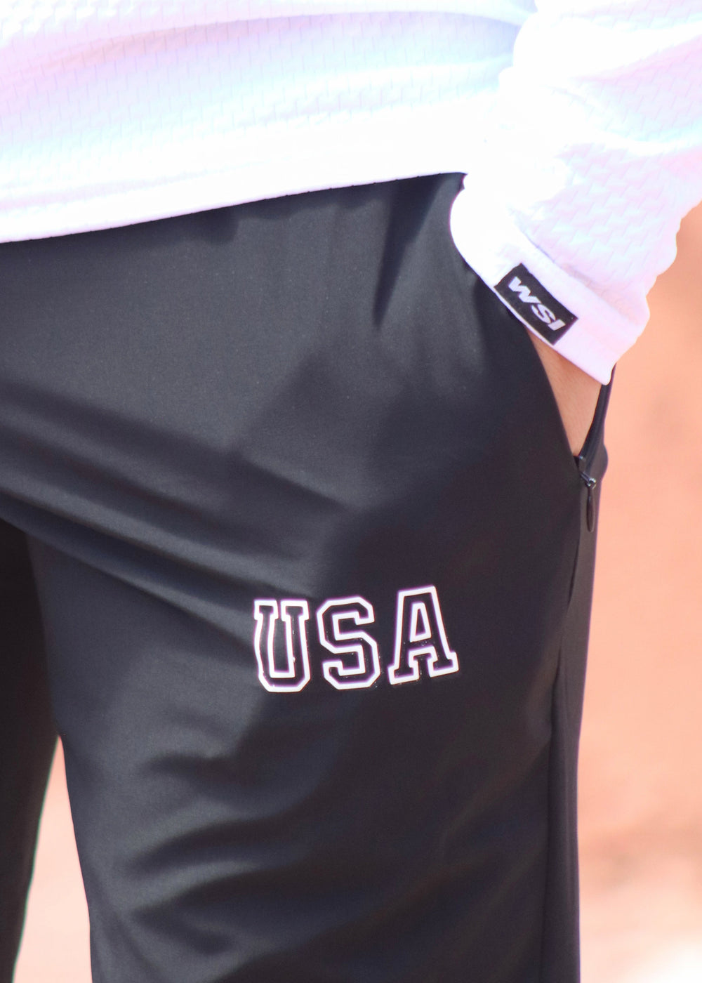 WSI Sportswear Men's Woven Training Pant in Black with USA Graphic, Made in USA, Designed for training, Zippered and secured pockets, Ankle zips 