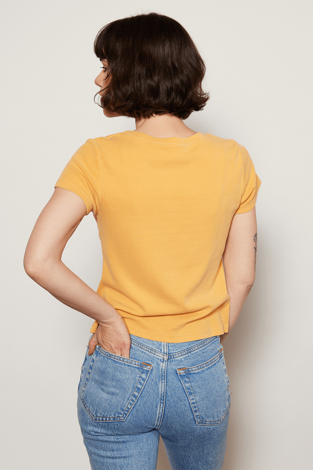 Add a little childhood nostalgia to your wardrobe. Our Peanuts "Have a Good One" Baby Tee is made in USA from 100% organic micro-rib cotton, making it ultra soft and body flattering. 
