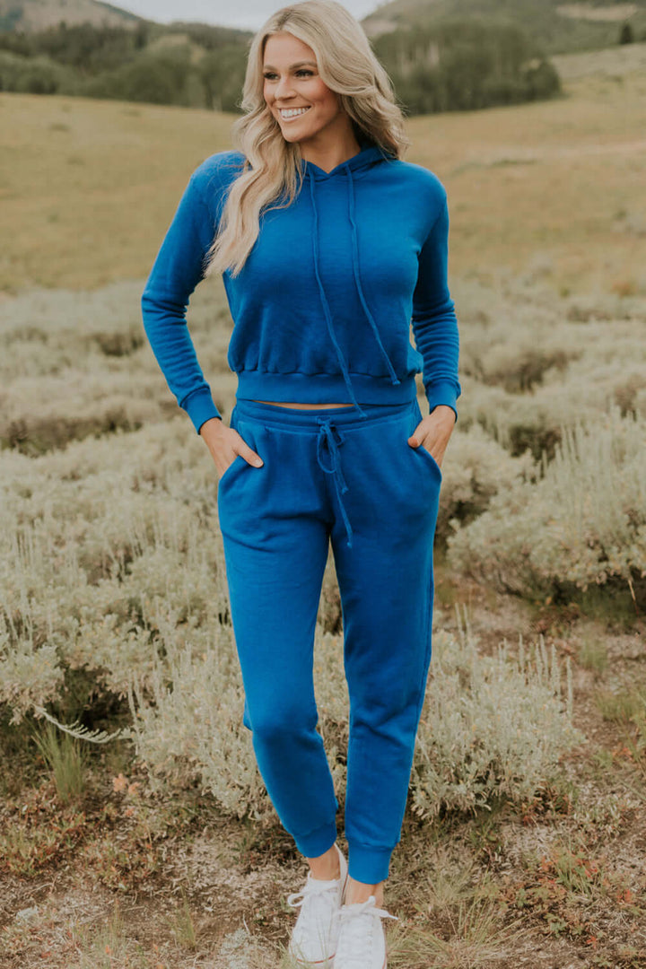 This vintage inspired cropped hoodie is made from light-weight 100% organic cotton. Wear this on a cozy coffee date on an overcast day or a movie night in with friends.  100% Organic Cotton Made in USA